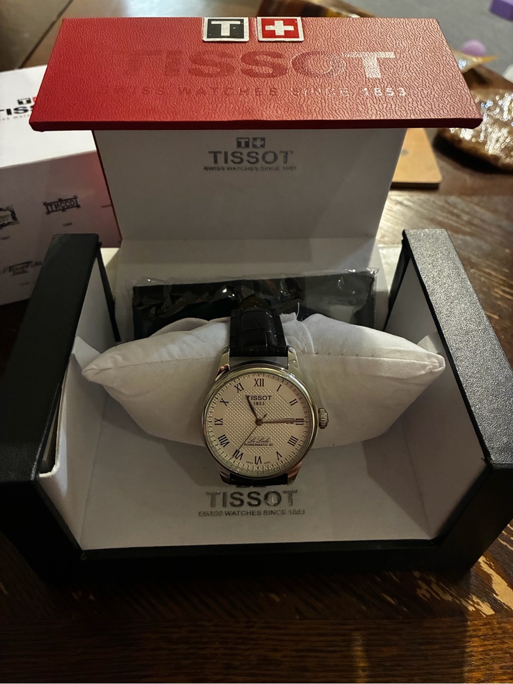 Tissot Silver Dial Watch with Black Leather Strap